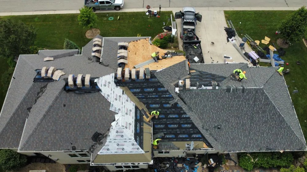 Aerial view of roof replacement in progress